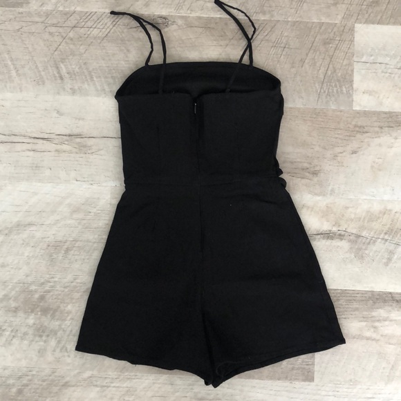 Black Romper with Midsection Cutout - Picture 2 of 3